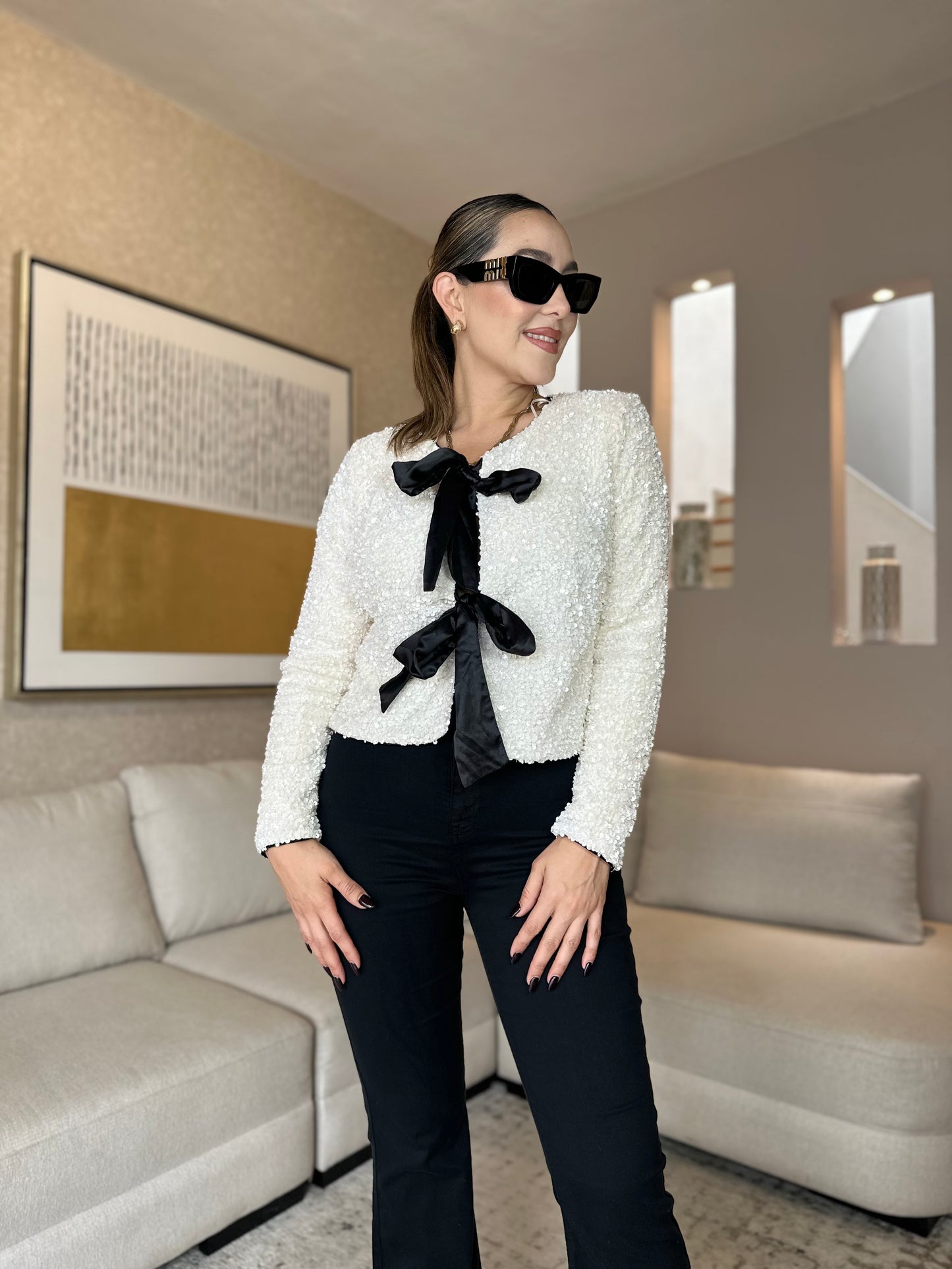 TORERA LENTEJUELA BLANCA CON MONIOS NEGRO